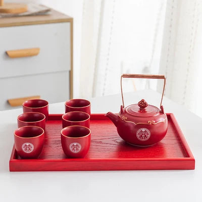 classic Double Happiness teapot paired with matching cups — vibrant red, beautifully detailed, and perfect for weddings, home décor, or thoughtful gifting.