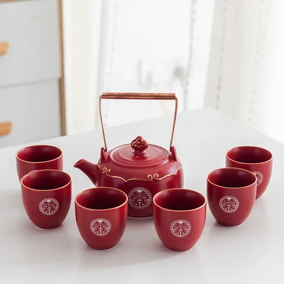 classic Double Happiness teapot paired with matching cups — vibrant red, beautifully detailed, and perfect for weddings, home décor, or thoughtful gifting.