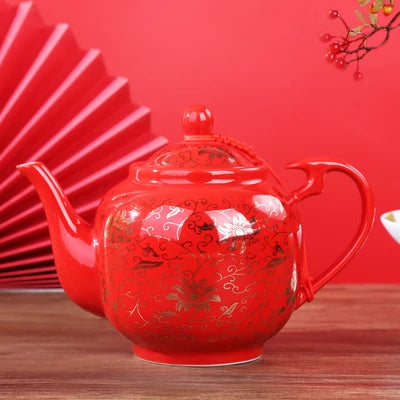 Red ceramic teapot set features the iconic Double Happiness symbol — a timeless emblem of love, unity, and celebration.