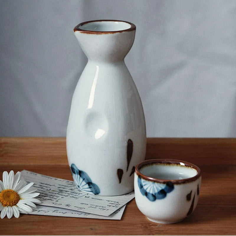 Japanese‑style ceramic sake pot and cups set — a creative bar piece with a Chinese wine separator, perfect for baijiu, sake, or home entertaining