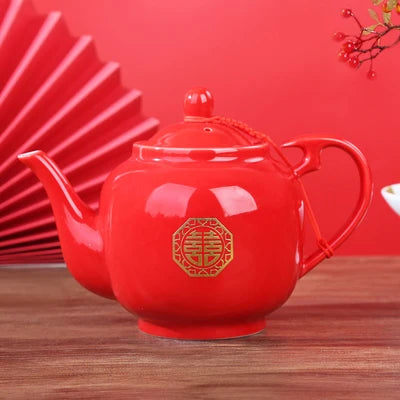 Red ceramic teapot set features the iconic Double Happiness symbol — a timeless emblem of love, unity, and celebration.