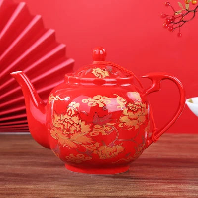 Red ceramic teapot set features the iconic Double Happiness symbol — a timeless emblem of love, unity, and celebration.