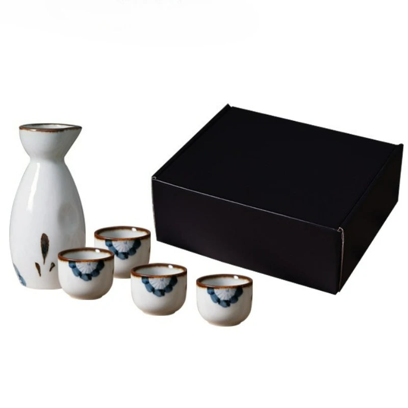 Japanese‑style ceramic sake pot and cups set — a creative bar piece with a Chinese wine separator, perfect for baijiu, sake, or home entertaining