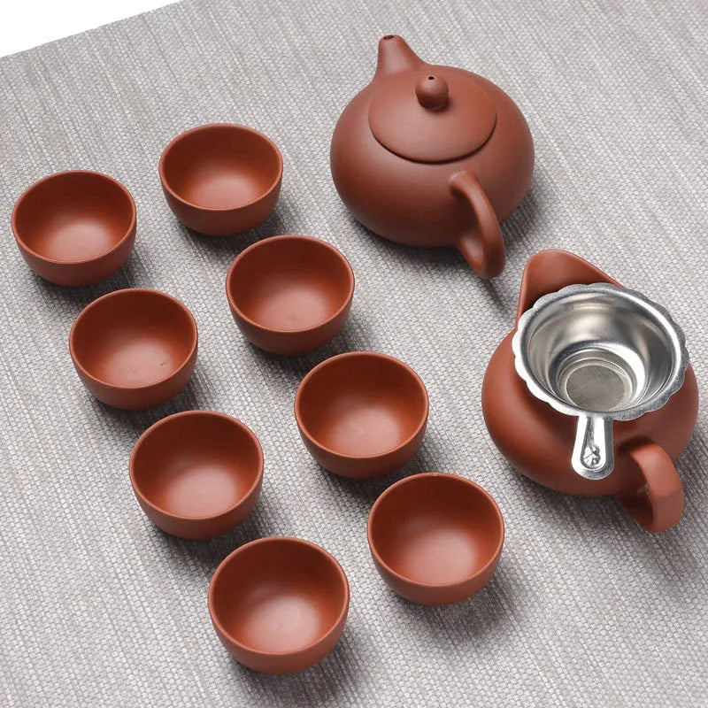 Look at this handmade Clay Kung Fu Tea Set — an authentic Yixing Zisha teapot with matching cups, perfect for brewing rich puer tea.