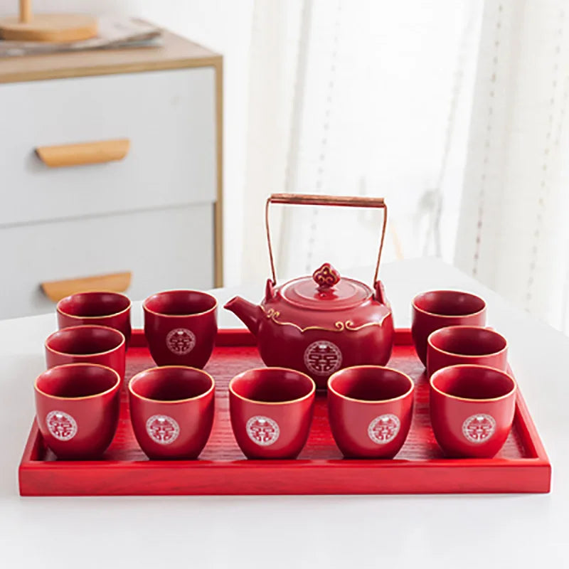 classic Double Happiness teapot paired with matching cups — vibrant red, beautifully detailed, and perfect for weddings, home décor, or thoughtful gifting.
