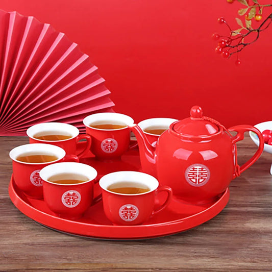 Red ceramic teapot set features the iconic Double Happiness symbol — a timeless emblem of love, unity, and celebration.