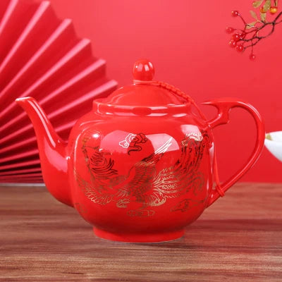 Red ceramic teapot set features the iconic Double Happiness symbol — a timeless emblem of love, unity, and celebration.