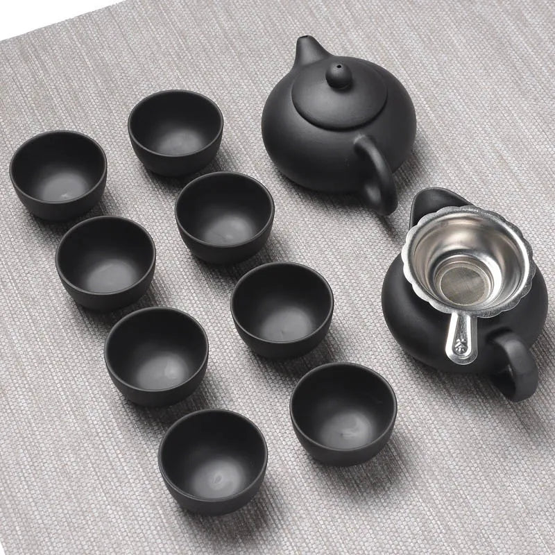 Look at this handmade Clay Kung Fu Tea Set — an authentic Yixing Zisha teapot with matching cups, perfect for brewing rich puer tea.