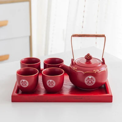 classic Double Happiness teapot paired with matching cups — vibrant red, beautifully detailed, and perfect for weddings, home décor, or thoughtful gifting.
