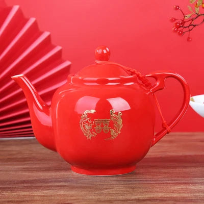 Red ceramic teapot set features the iconic Double Happiness symbol — a timeless emblem of love, unity, and celebration.